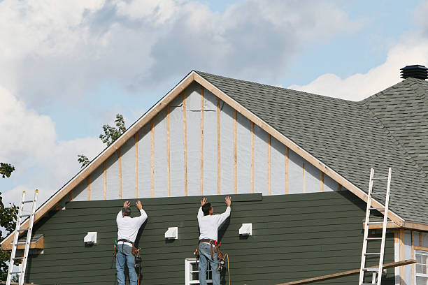 Professional Siding Repair technician working in Uhrichsville, OH